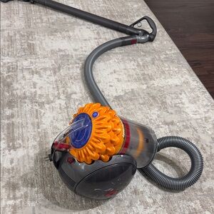 Dyson Vacuum Cleaner - Orange and Gray